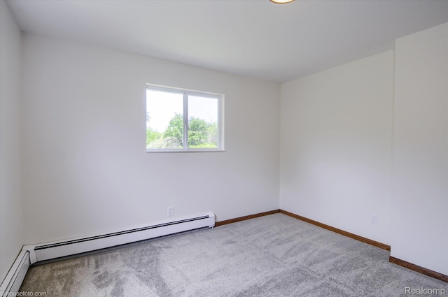 2680 N Lake George Rd, Metamora, MI 48455 - carpeted empty room with baseboards and a baseboard heating unit
