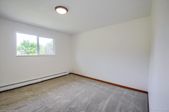 2680 N Lake George Rd, Metamora, MI 48455 - unfurnished room featuring a baseboard heating unit, carpet floors, and baseboards