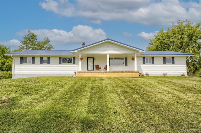 2680 N Lake George Rd, Metamora, MI 48455 - back of property with covered porch, a lawn, and metal roof