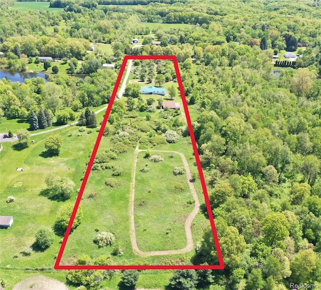 2680 N Lake George Rd, Metamora, MI 48455 - aerial view of property and surrounding area with property boundaries highlighted and a forest