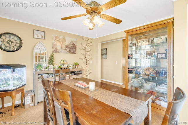 3889 Wadhams Rd, Clyde, MI 48049 - dining area with ceiling fan, baseboards, and crown molding