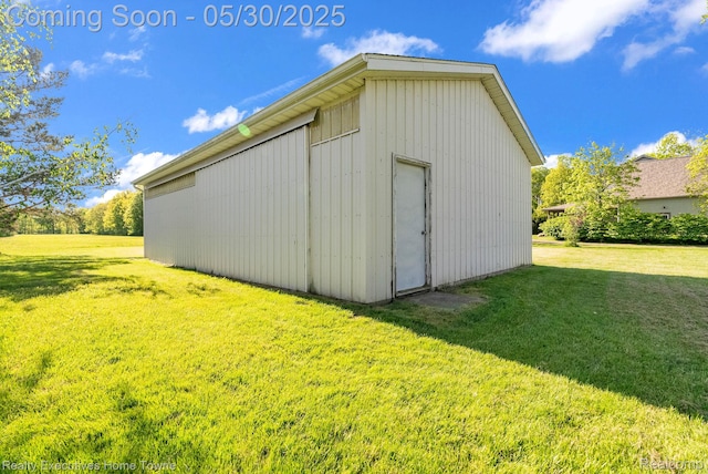 3889 Wadhams Rd, Clyde, MI 48049 - view of pole building with a yard