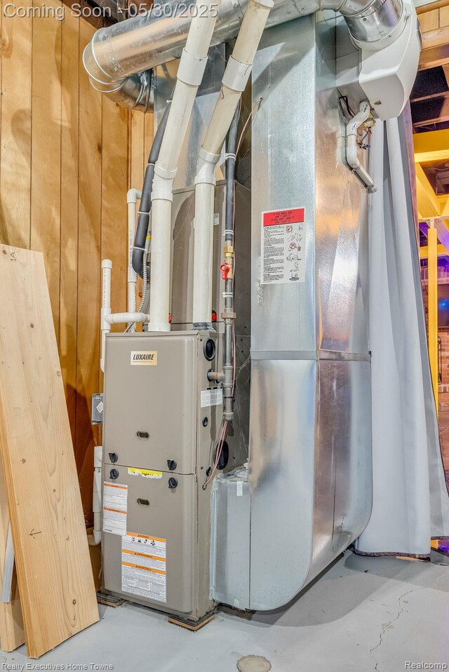 3889 Wadhams Rd, Clyde, MI 48049 - utility room with heating unit