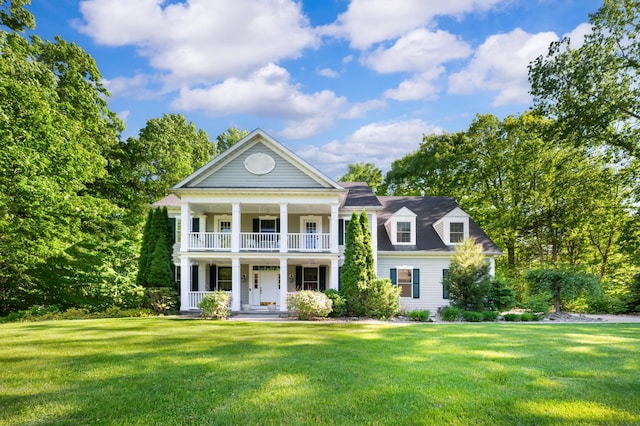 1796 Stockbridge Path, Saint Joseph, MI 49085 - greek revival inspired property featuring covered porch, a front yard, and a balcony