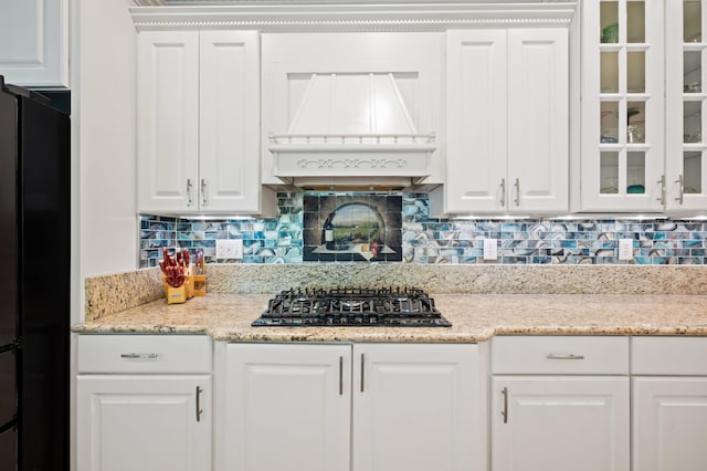 1796 Stockbridge Path, Saint Joseph, MI 49085 - kitchen featuring black appliances, glass insert cabinets, decorative backsplash, and white cabinets