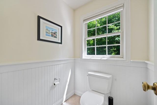 1796 Stockbridge Path, Saint Joseph, MI 49085 - half bath featuring wainscoting, healthy amount of natural light, and toilet