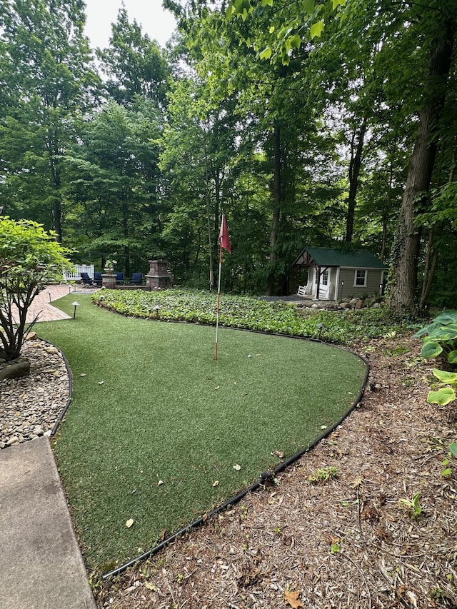 1796 Stockbridge Path, Saint Joseph, MI 49085 - view of yard featuring a putting green and an outbuilding