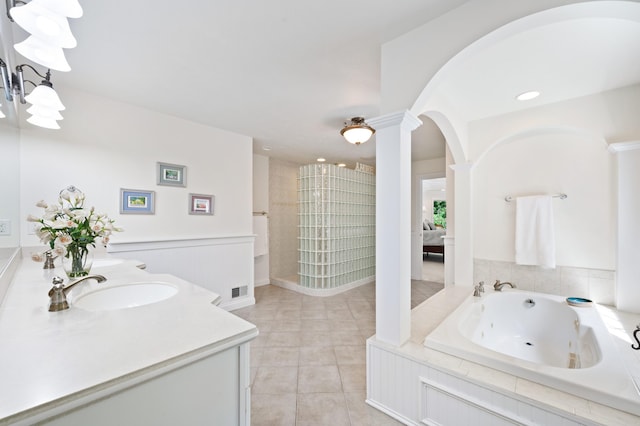 1796 Stockbridge Path, Saint Joseph, MI 49085 - bathroom with a whirlpool tub, double vanity, tile patterned flooring, and ensuite bathroom