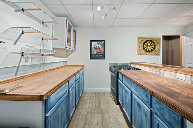 1796 Stockbridge Path, Saint Joseph, MI 49085 - kitchen with wood counters, blue cabinetry, stainless steel gas range oven, and light wood finished floors