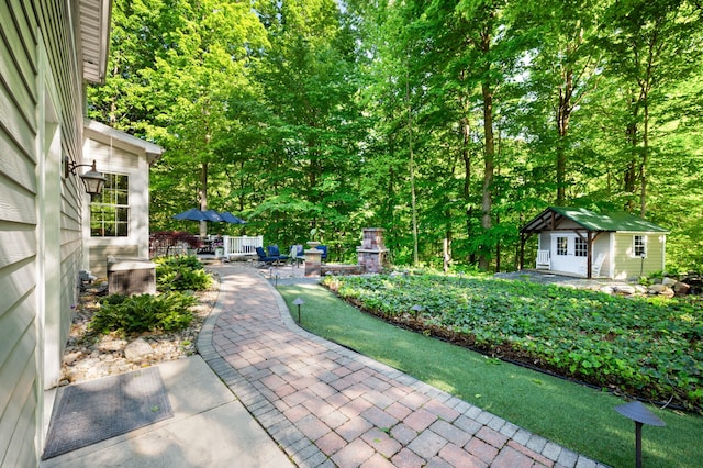 1796 Stockbridge Path, Saint Joseph, MI 49085 - view of yard with a patio area and an outdoor structure
