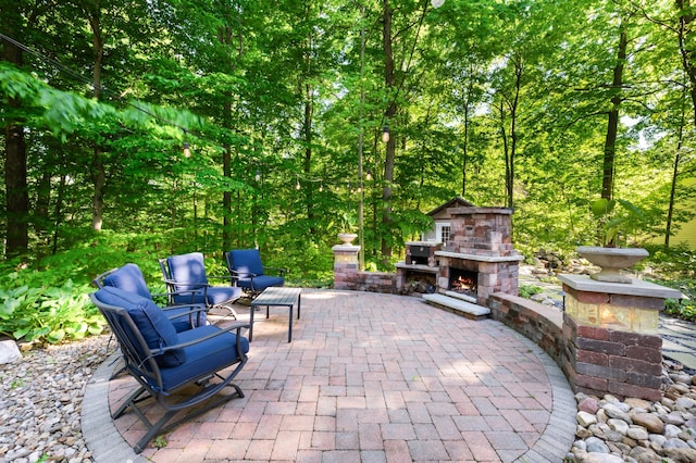 1796 Stockbridge Path, Saint Joseph, MI 49085 - view of patio / terrace with an outdoor stone fireplace