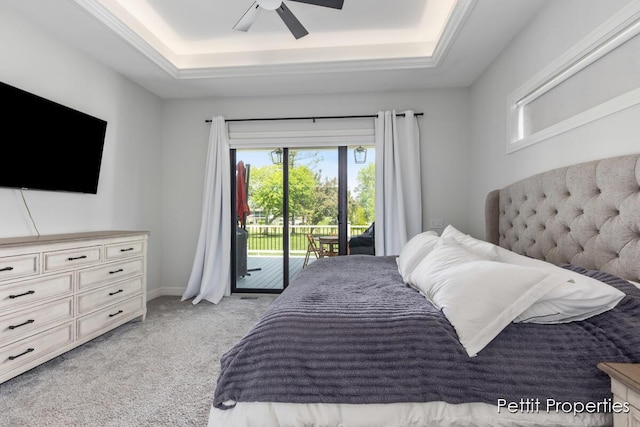 1509 Ponstein Dr, Hudsonville, MI 49426 - bedroom featuring access to outside, a raised ceiling, light colored carpet, and ceiling fan