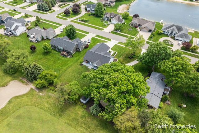 1509 Ponstein Dr, Hudsonville, MI 49426 - aerial view of property's location with nearby suburban area and a nearby body of water