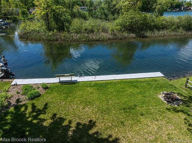 6863 Brightwood Ct, Waterford, MI 48327 - dock featuring a water view and a lawn
