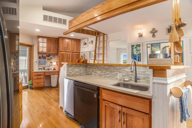 6180 Murray Rd Unit 301, Whitehall, MI 49461 - kitchen featuring stainless steel appliances, a sink, tasteful backsplash, brown cabinets, and beam ceiling