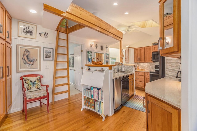 6180 Murray Rd Unit 301, Whitehall, MI 49461 - kitchen featuring a sink, range with electric stovetop, dishwashing machine, ceiling fan, and light wood-style flooring