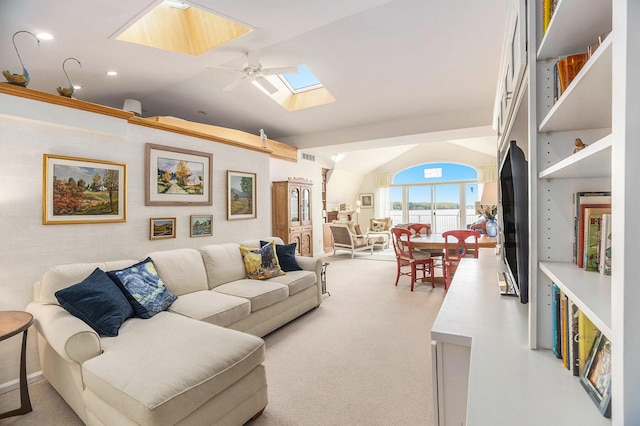 6180 Murray Rd Unit 301, Whitehall, MI 49461 - living room featuring a skylight, vaulted ceiling, carpet, and a ceiling fan
