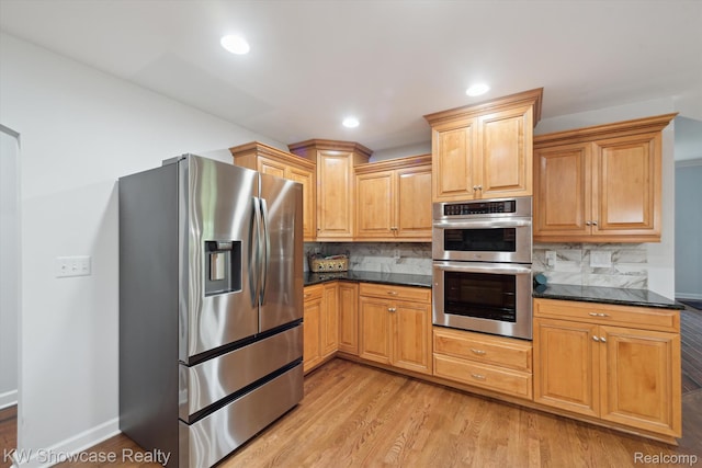 9120 Pineview Lake Dr, Linden, MI 48451 - kitchen with stainless steel appliances, light wood finished floors, tasteful backsplash, and recessed lighting