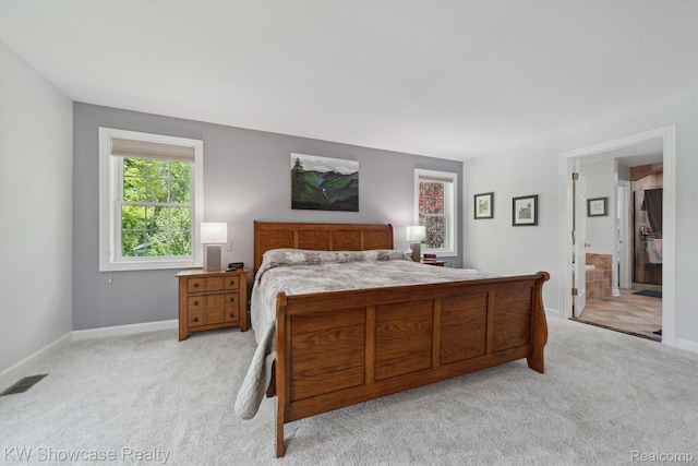 9120 Pineview Lake Dr, Linden, MI 48451 - bedroom featuring light carpet and baseboards