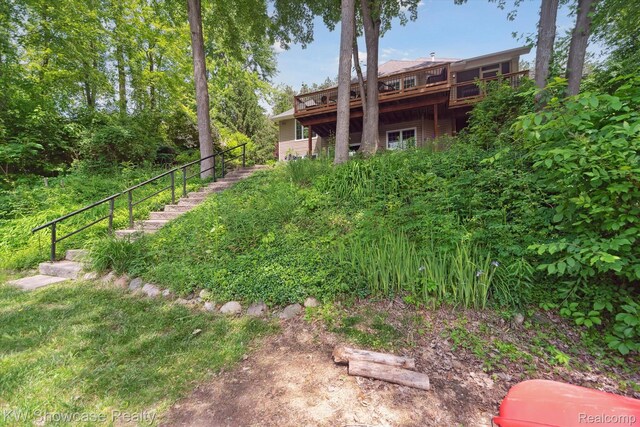 9120 Pineview Lake Dr, Linden, MI 48451 - view of yard with a deck