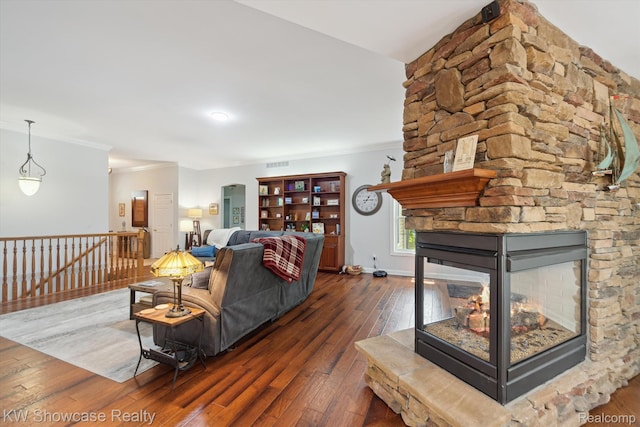 9120 Pineview Lake Dr, Linden, MI 48451 - living room with hardwood / wood-style flooring, crown molding, a fireplace, and baseboards