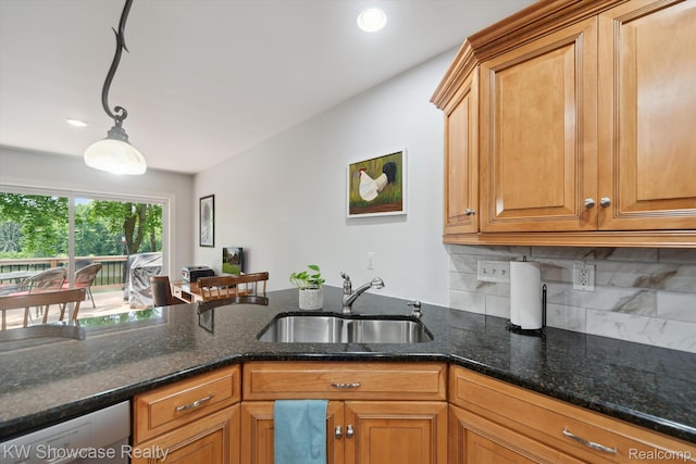 9120 Pineview Lake Dr, Linden, MI 48451 - kitchen with a sink, decorative backsplash, dark stone counters, dishwasher, and brown cabinetry