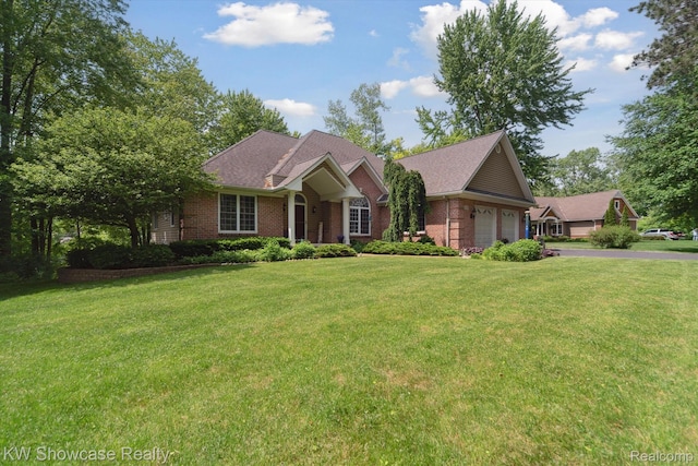 9120 Pineview Lake Dr, Linden, MI 48451 - ranch-style home with an attached garage, brick siding, and a front lawn
