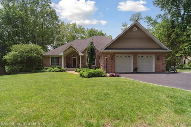9120 Pineview Lake Dr, Linden, MI 48451 - ranch-style house with driveway, an attached garage, and brick siding