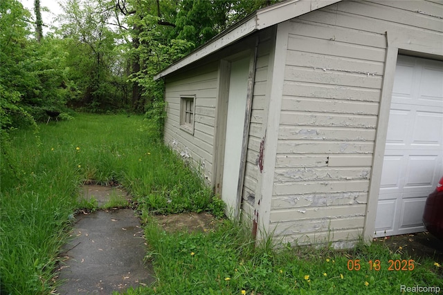 16073 Ellsworth St, Detroit, MI 48227 - view of outbuilding featuring a garage