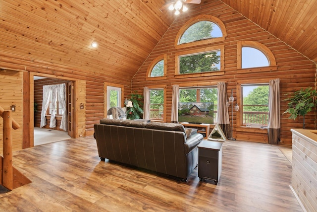 1750 Fox Rd, Jackson, MI 49201 - living area featuring high vaulted ceiling, wooden ceiling, wood finished floors, and a ceiling fan