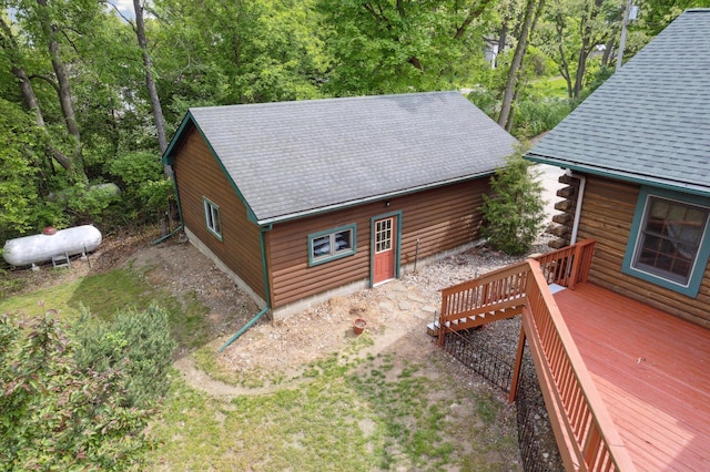 1750 Fox Rd, Jackson, MI 49201 - view of property exterior with a deck and a shingled roof