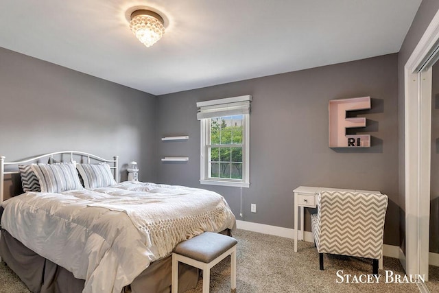 2420 Abbington Dr SE Unit 40, Grand Rapids, MI 49506 - bedroom with carpet floors and baseboards