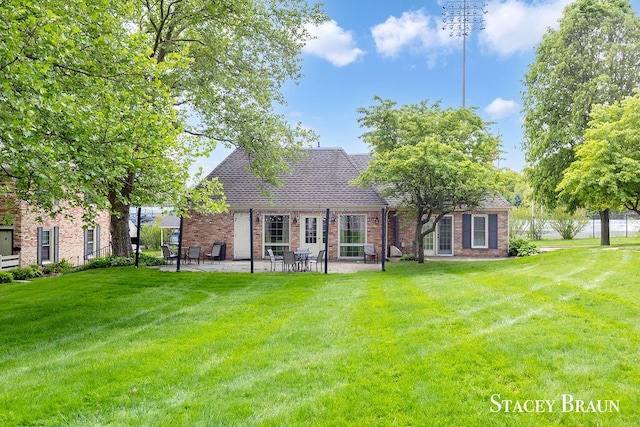 2420 Abbington Dr SE Unit 40, Grand Rapids, MI 49506 - back of house with a patio area and brick siding