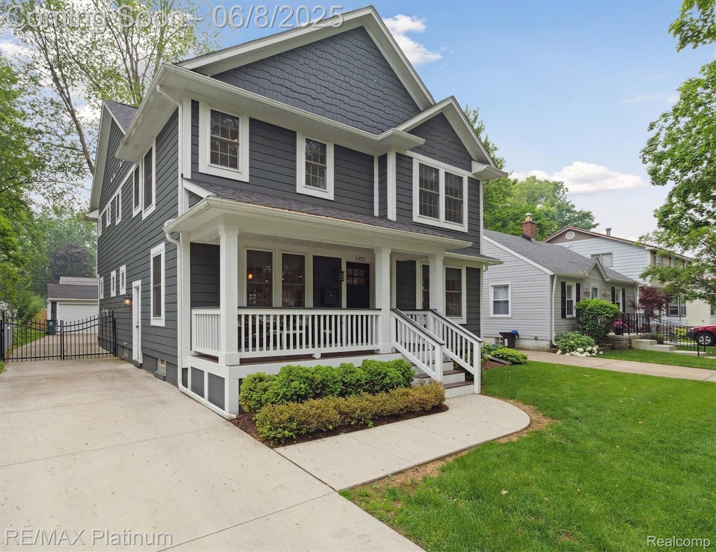 1032 Ferris Ave, Royal Oak, MI 48067 - view of front of home with covered porch and an outdoor structure