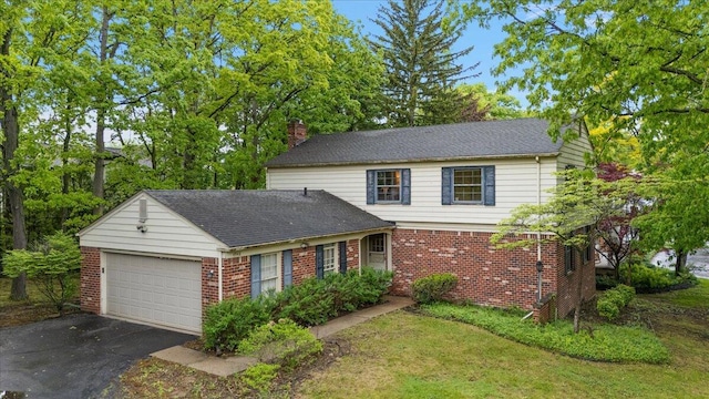 4948 Hardwoods Dr, West Bloomfield, MI 48323 - traditional-style home featuring brick siding, a chimney, driveway, an attached garage, and a shingled roof