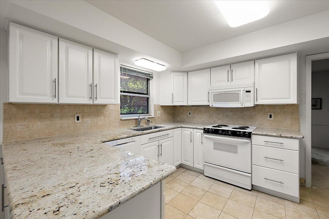 4948 Hardwoods Dr, West Bloomfield, MI 48323 - kitchen with white appliances, a sink, and white cabinets