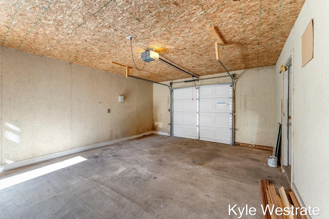 206 Pearl St, Sheridan, MI 48884 - garage with a garage door opener