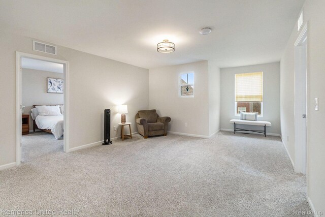 2670 Ironton Dr, Commerce Twp, MI 48382 - living area with carpet and baseboards