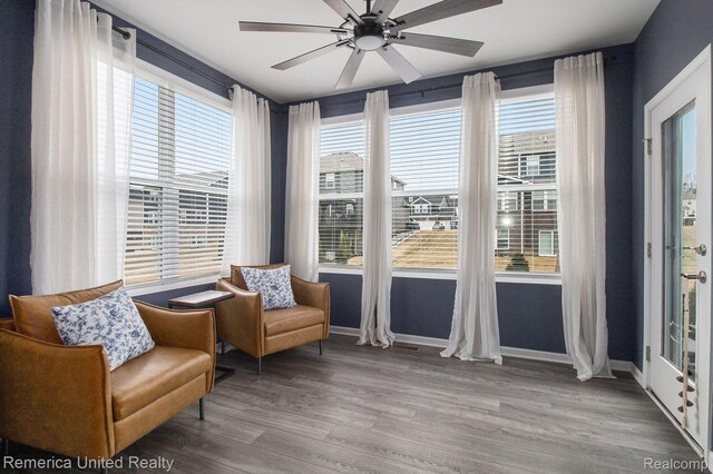 2670 Ironton Dr, Commerce Twp, MI 48382 - sitting room featuring a ceiling fan, plenty of natural light, wood finished floors, and baseboards