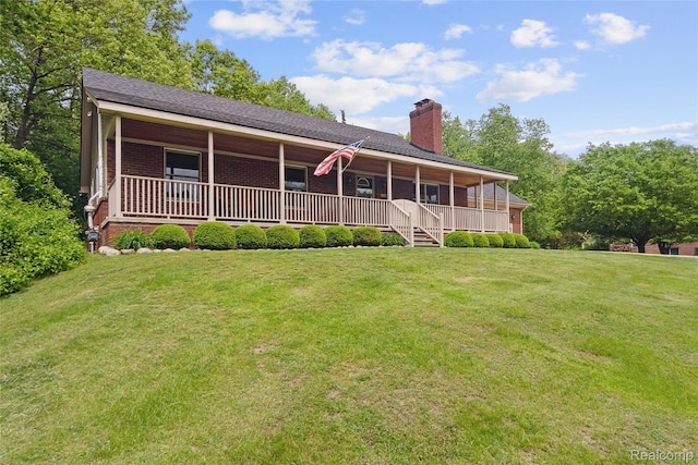 1330 Evergreen, Milford, MI 48380 - rear view of property featuring a porch, a chimney, a yard, and brick siding