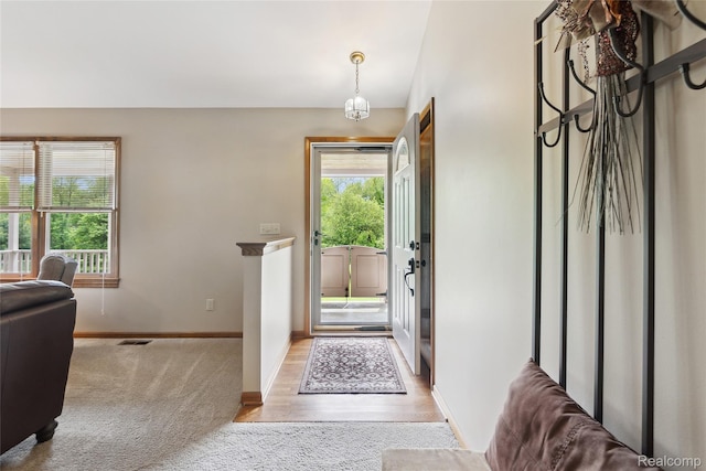 1330 Evergreen, Milford, MI 48380 - foyer entrance featuring light colored carpet and baseboards