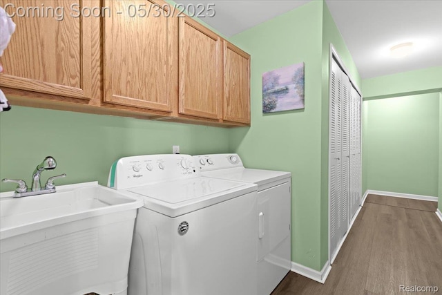 51623 Hale Ln, Chesterfield, MI 48051 - washroom with cabinet space, washing machine and clothes dryer, dark wood-type flooring, and baseboards