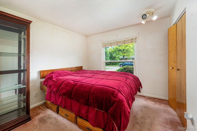 6439 Rockdale Ct, Dearborn Heights, MI 48127 - bedroom featuring carpet and baseboards