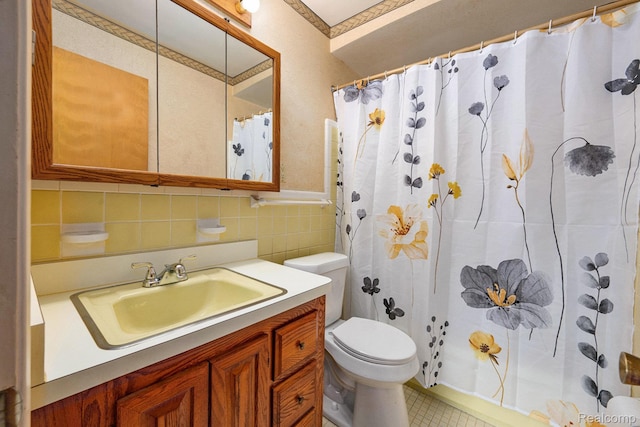 6439 Rockdale Ct, Dearborn Heights, MI 48127 - bathroom featuring toilet, vanity, tile walls, curtained shower, and tile patterned flooring