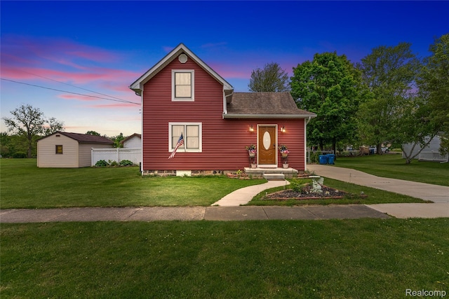 306 Hamilton St, Byron, MI 48418 - view of front facade with a front lawn and roof with shingles