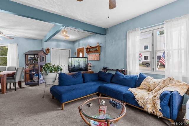 306 Hamilton St, Byron, MI 48418 - living area featuring ceiling fan, carpet floors, and beam ceiling