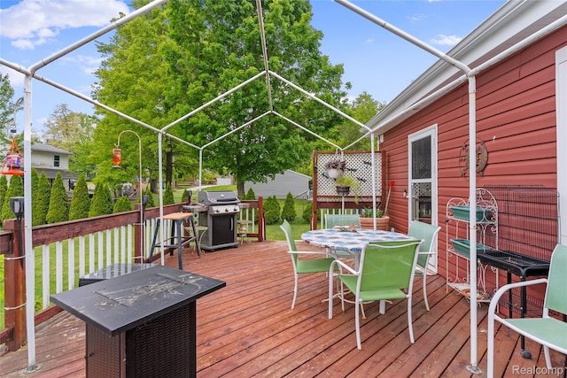 306 Hamilton St, Byron, MI 48418 - deck with outdoor dining space and area for grilling