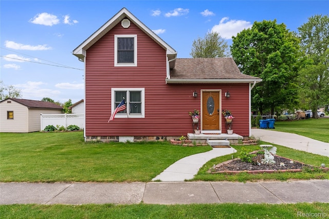 306 Hamilton St, Byron, MI 48418 - view of front of house with a shingled roof