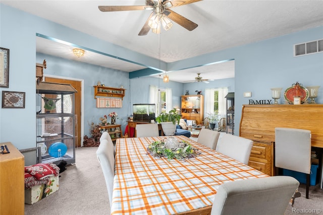 306 Hamilton St, Byron, MI 48418 - carpeted dining space featuring ceiling fan