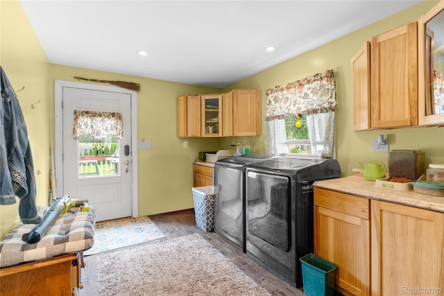 306 Hamilton St, Byron, MI 48418 - washroom with washing machine and dryer, cabinet space, wood finished floors, and recessed lighting
